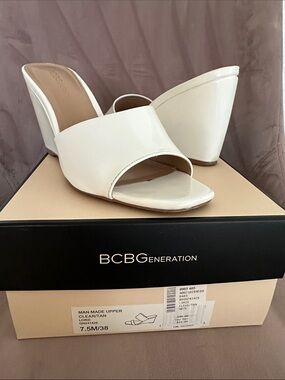 BCBGeneration white Open-Toe Wedge Slide Mules